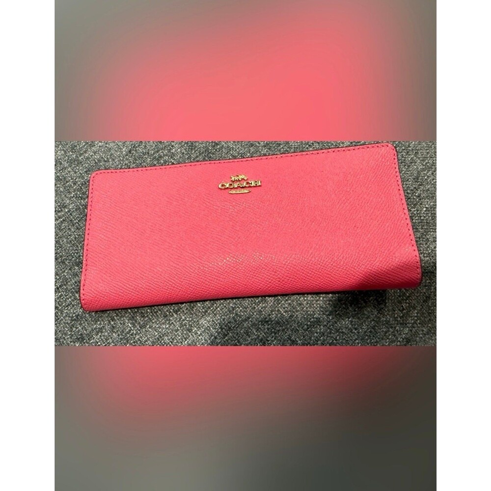 Coach long pink wallet with gold logo